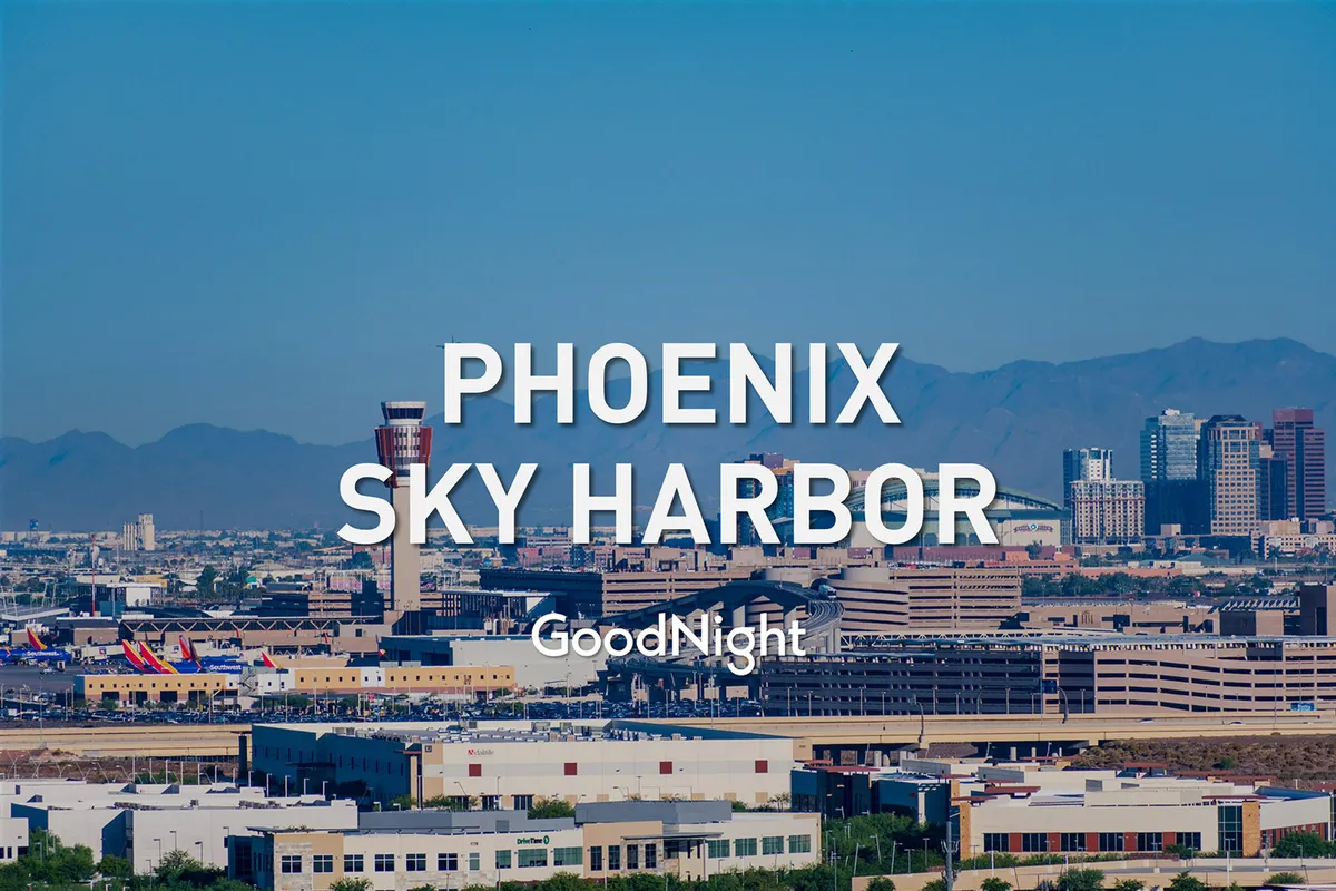 This image captures Phoenix Sky Harbor Airport with its runways, adjacent city skyline, and surrounding mountains. The scene evokes a sense of arrival and departure, highlighting the ease of access to major transportation hubs and the urban landscape that business and digital travelers frequent.